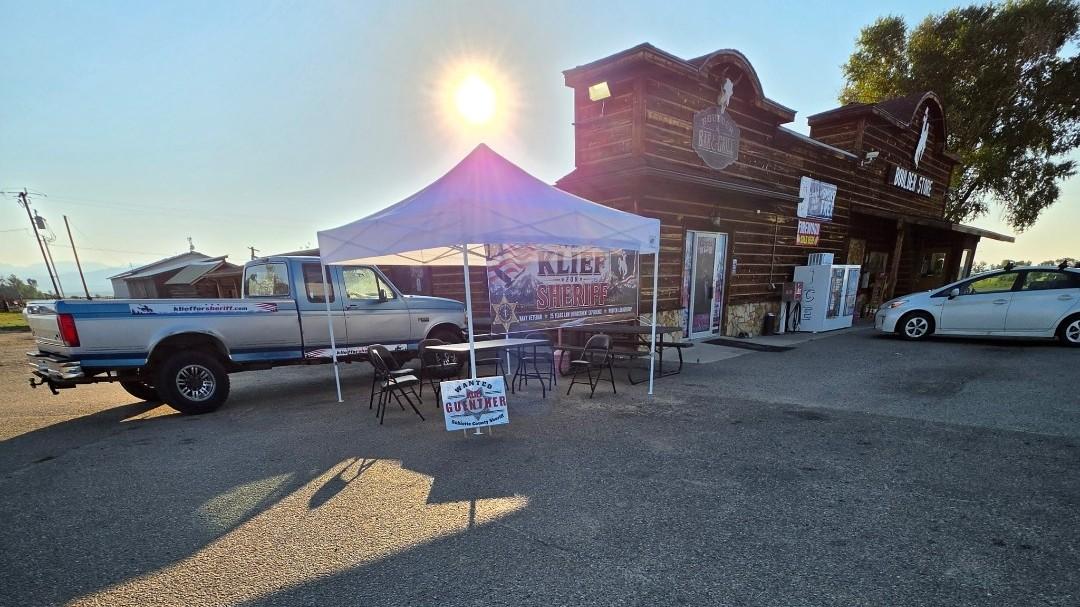Klief for Sheriff tent and truck outside the Boulder Store for Coffee and Conversation