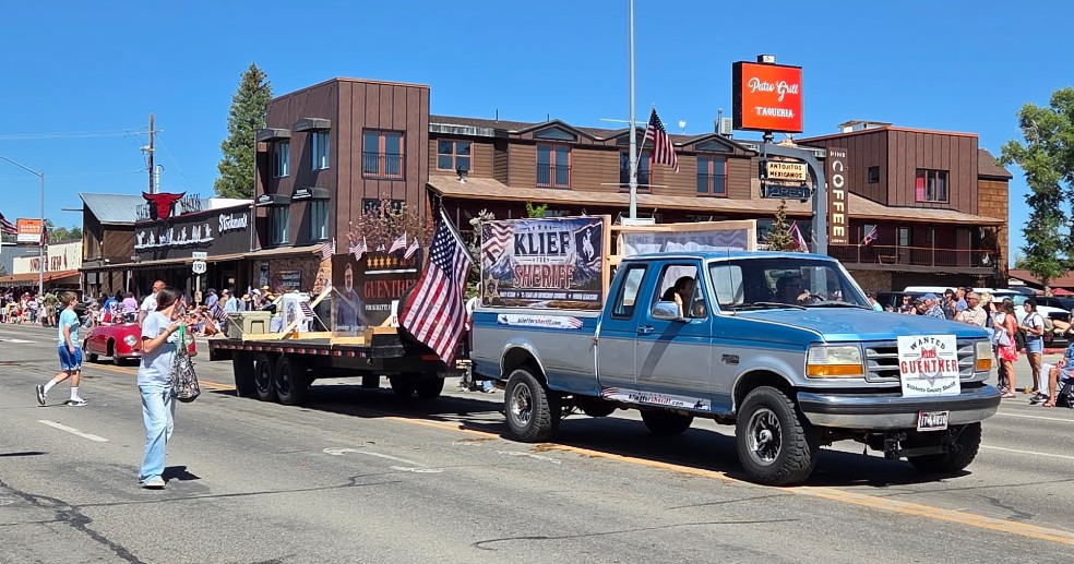 Klief for Sheriff truck and float on Pinedale's Main Street at the Green River Rendezvous Parade